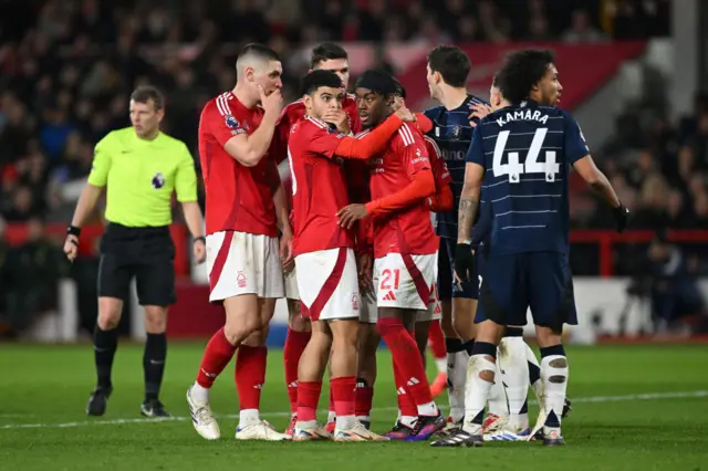 Forest players celebrate after their second goal