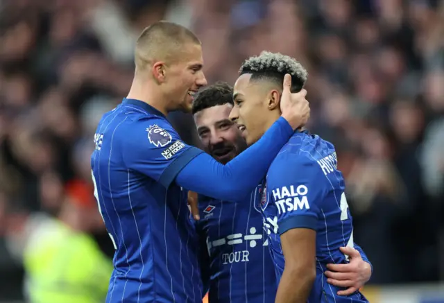 Conor Chaplin of Ipswich Town celebrates with Harry Clarke and Omari Hutchinson