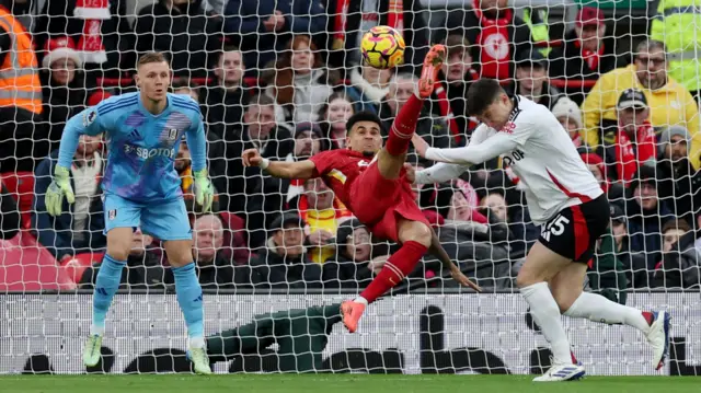 Liverpool's Luis Diaz attempts an overhead shot