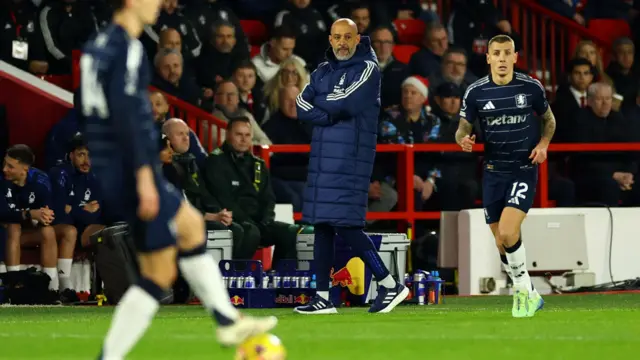 Nottingham Forest manager Nuno Espirito Santo looks on at Aston Villa's Lucas Digne in action