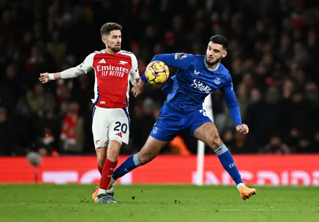 Arsenal's Jorginho in action with Everton's Armando Broja