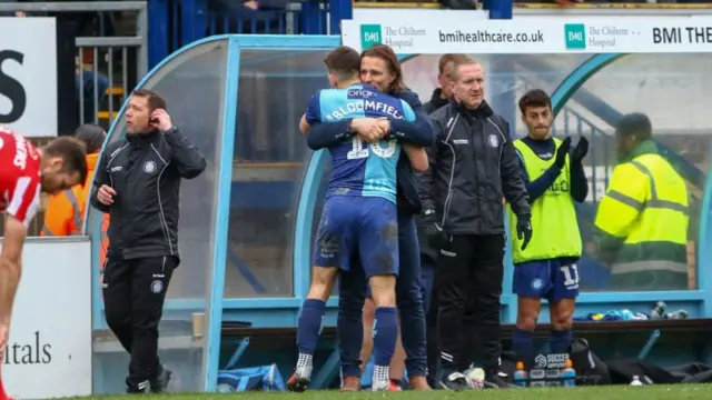 Then Wycombe Wanderers boss Gareth Ainsworth hugs Matt Bloomfield during Wycombe v Sunderland in 2019 to mark his 500th appearance