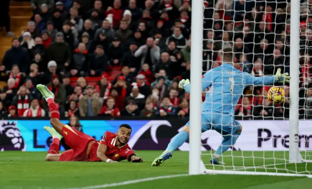 Liverpool's Cody Gakpo scores their first goal past Fulham's Bernd Leno