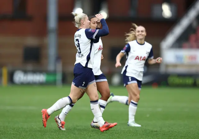 England celebrates her goal against Everton with teammates