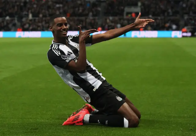 Newcastle United's Alexander Isak celebrates scoring their third goa