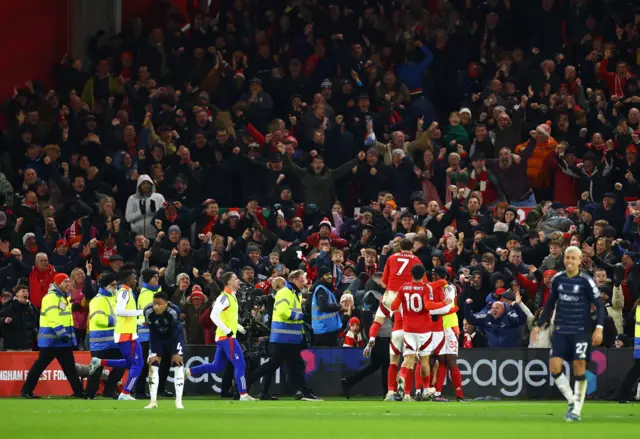 Forest players celebrate after scoring their second goal