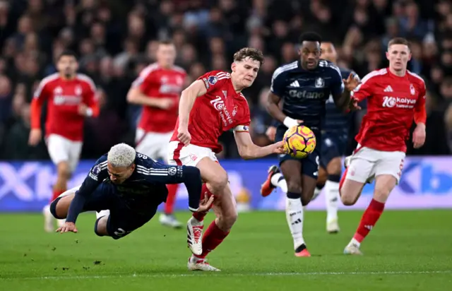 Ryan Yates of Nottingham Forest battles for possession with Morgan Rogers of Aston Villa