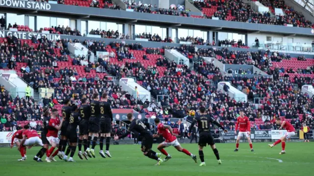 Scott Twine scores a free-kick