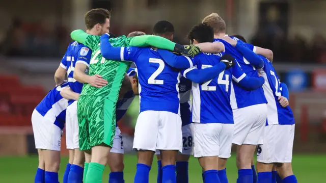 Birmingham City players in a huddle pre-match against Barnsley