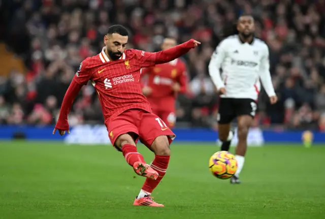 Mohamed Salah of Liverpool passes the ball