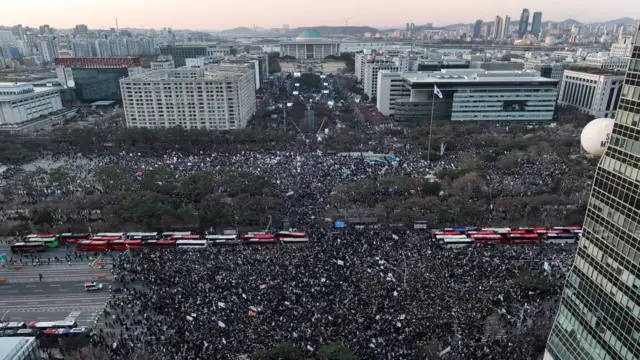 Protesters participate in a rally calling for the impeachment of South Korean President Yoon Suk Yeol