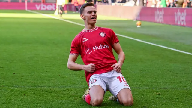 Scott Twine celebrates scoring against QPR