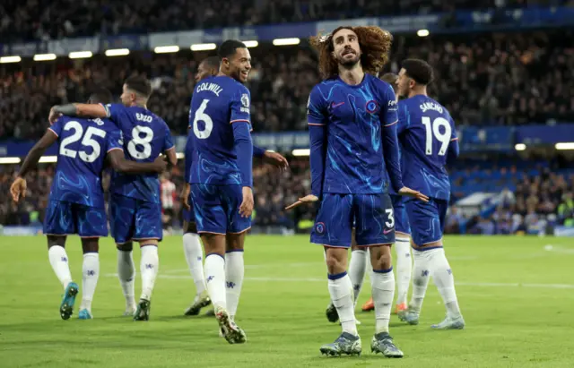 Cucurella celebrates after scoring for Chelsea