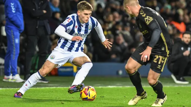 West Bromwich Albion's Tom Fellows takes on an opponent