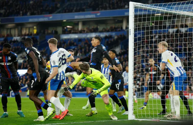 Crystal Palace's Marc Guehi scores Brighton & Hove Albion's first with an own goal