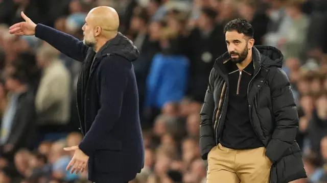 Manchester United manager Ruben Amorim watches on as Manchester City manager Pep Guardiola gestures on the touchline