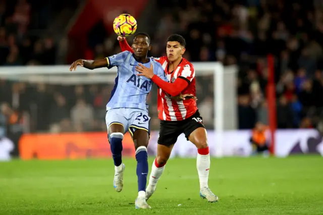 Pape Sarr of Tottenham Hotspur and Mateus Fernandes of Southampton