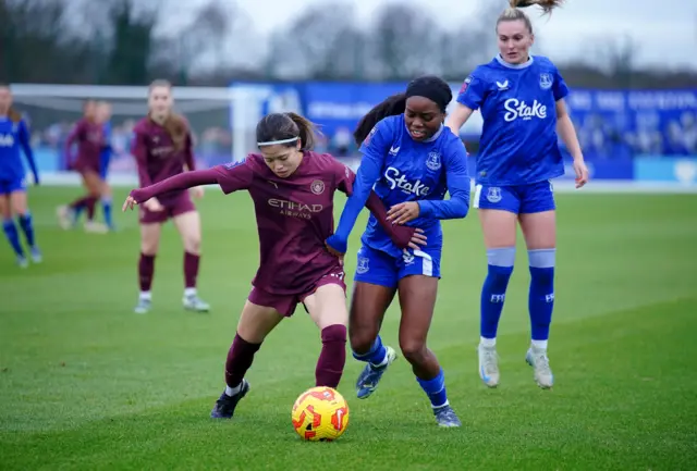 Yui Hasegawa (left) and Everton's Toni Payne battle for the ball