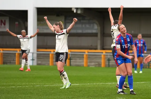 Manchester United's Elisabeth Terland (centre) celebrates their side's first goal of the game, scored by team-mate Grace Clinton