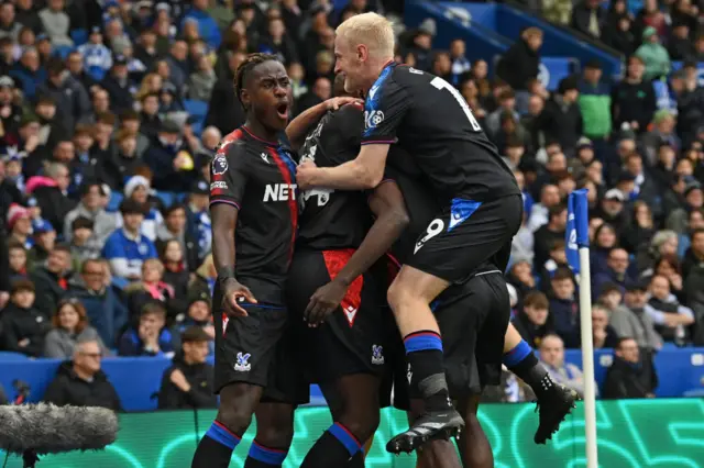 Ismaila Sarr celebrates with teammates after scoring