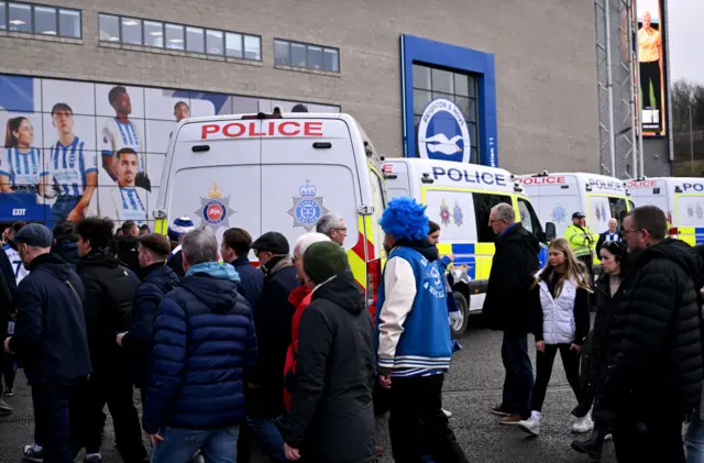 Police vans at Amex Stadium