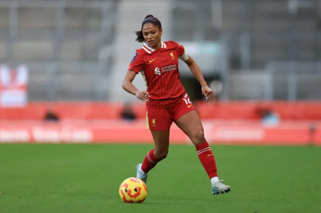 Taylor Hinds of Liverpool runs with the ball