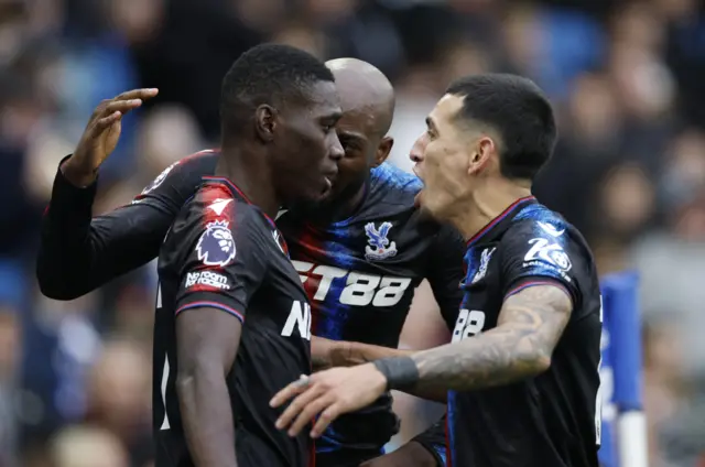 Crystal Palace's Ismaila Sarr celebrates scoring their second goal with Jean-Philippe Mateta and Daniel Munoz