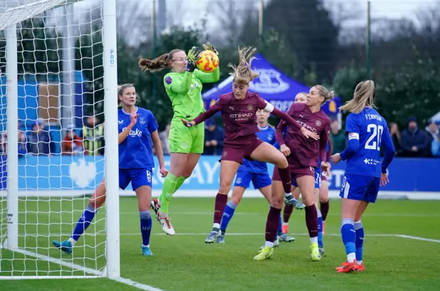 Everton goalkeeper Courtney Brosnan saves an attempt on goal from Manchester City's Laia Aleixandri (