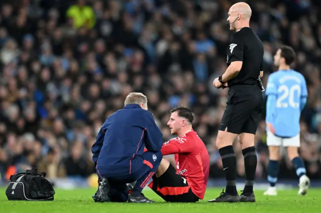 Mason Mount of Manchester United goes down with an injury