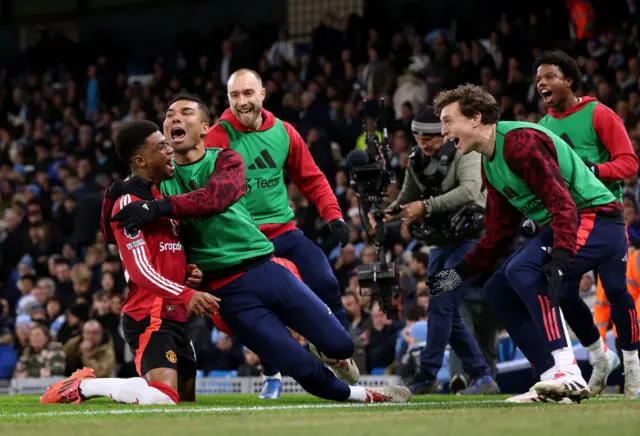 Amad Diallo of Manchester United celebrates scoring his team's second goal with teammates