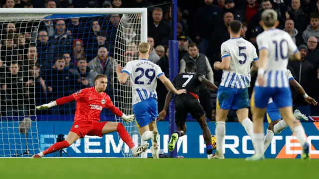 Crystal Palace's Ismaila Sarr scores their third goal past Brighton & Hove Albion's Bart Verbruggen