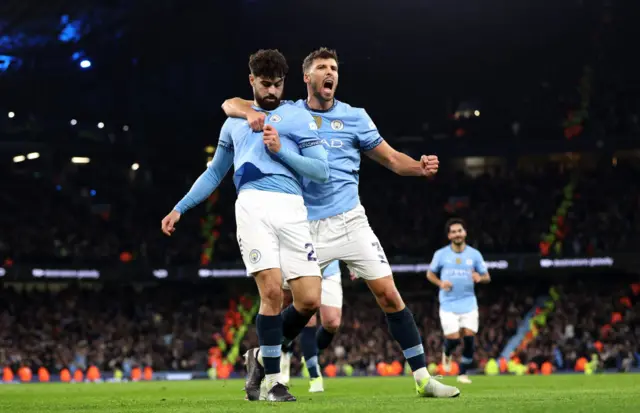 Josko Gvardiol of Manchester City celebrates scoring his team's first goal with teammate Ruben Dias