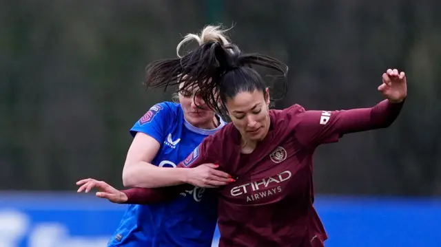 Everton's Melissa Lawley (left) and Manchester City's Leila Ouahabi battle for the ball