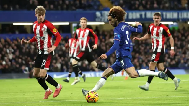 Marc Cucurella of Chelsea crosses the ball