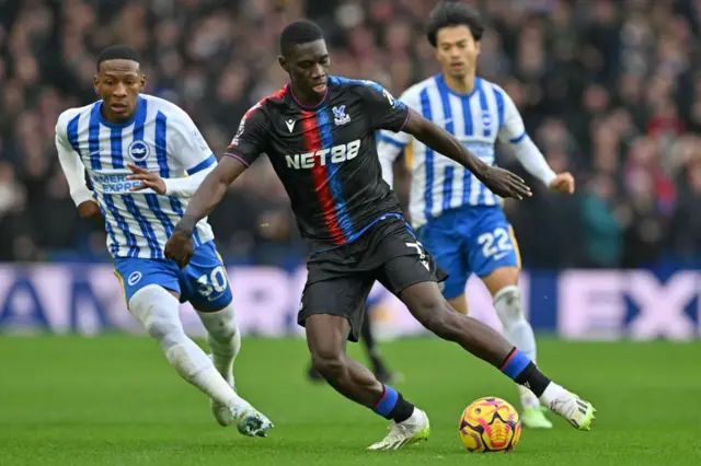 Crystal Palace midfielder Ismaila Sarr vies for the ball