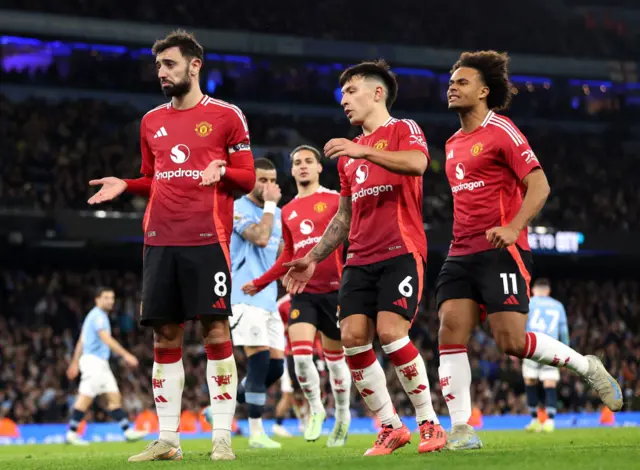 Bruno Fernandes of Manchester United celebrates scoring his team's first goal from a penalty