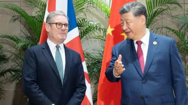 Keir Starmer stands to the left of Xi Jinping at a meeting in November 2024
