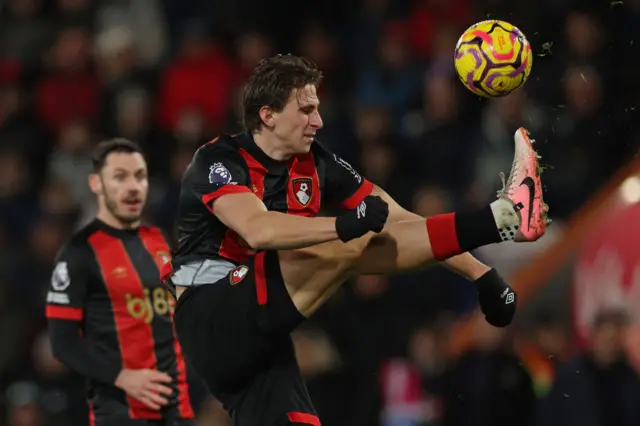 Illia Zabarnyi controls the ball