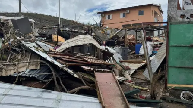 Ruins of homes lie in the aftermath of Cyclone Chido in Mayottee - 16 December 2024