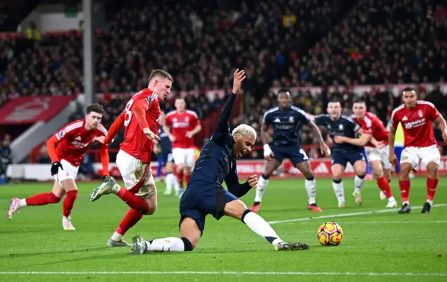 Nottingham Forest's Elliot Anderson challenges Aston Villa's Morgan Rogers