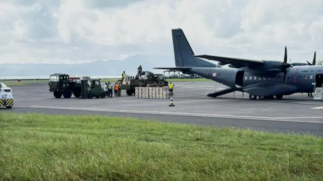 A French military plane delivers relief supplies