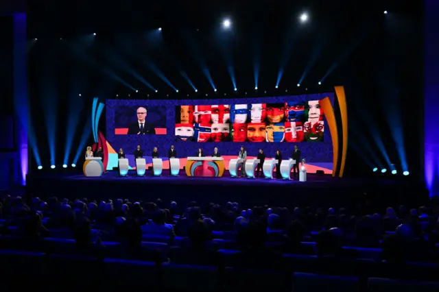 UEFA's Deputy General Secretary Giorgio Marchetti speaks on stage