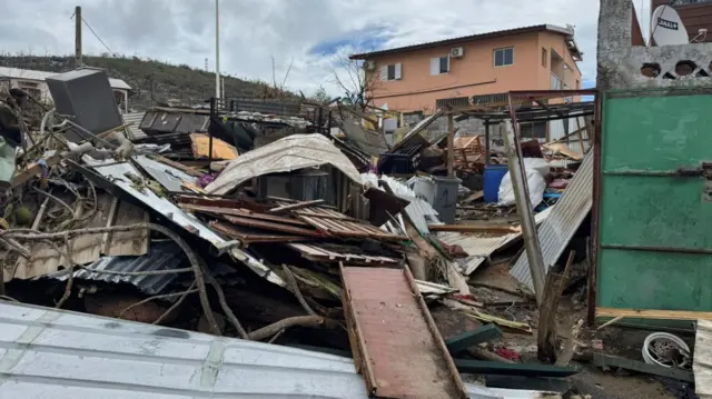 Ruins of homes lie in the wake of Cyclone Chido in Labattoir, Mayotte