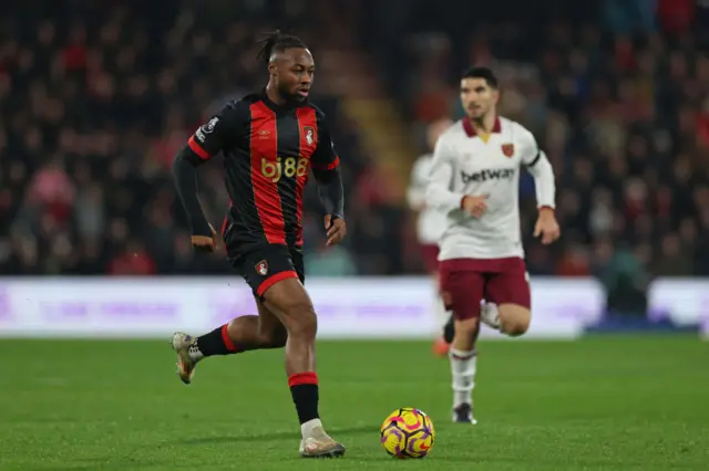 Antoine Semenyo runs with the ball