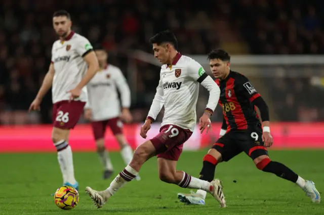 Edson Alvarez passes the ball