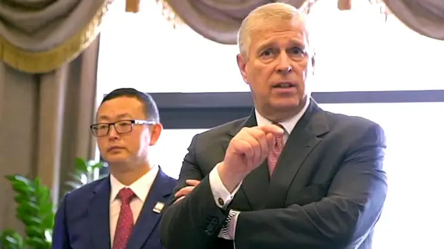 Prince Andrew stands next to Chinese businessman Yang Tengbo in a video published five years ago