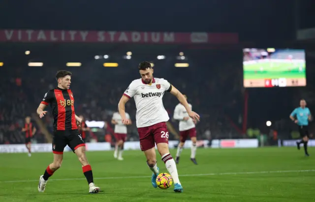 Ryan Christie  vies with Maximilian Kilman