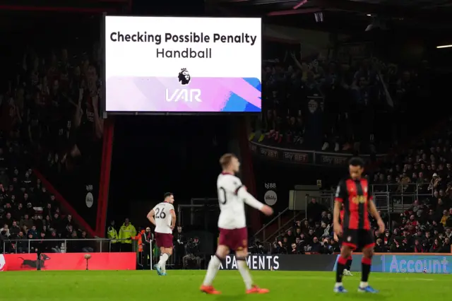 The big screen showing a VAR check for a possible penalty for West Ham United