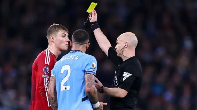 Rasmus Hojlund and Kyle Walker are booked by Anthony Taylor