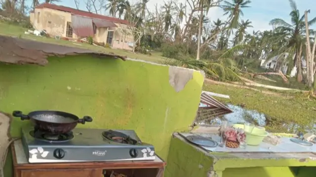 A kitchen is left exposed following Cyclone Chido in Agalega